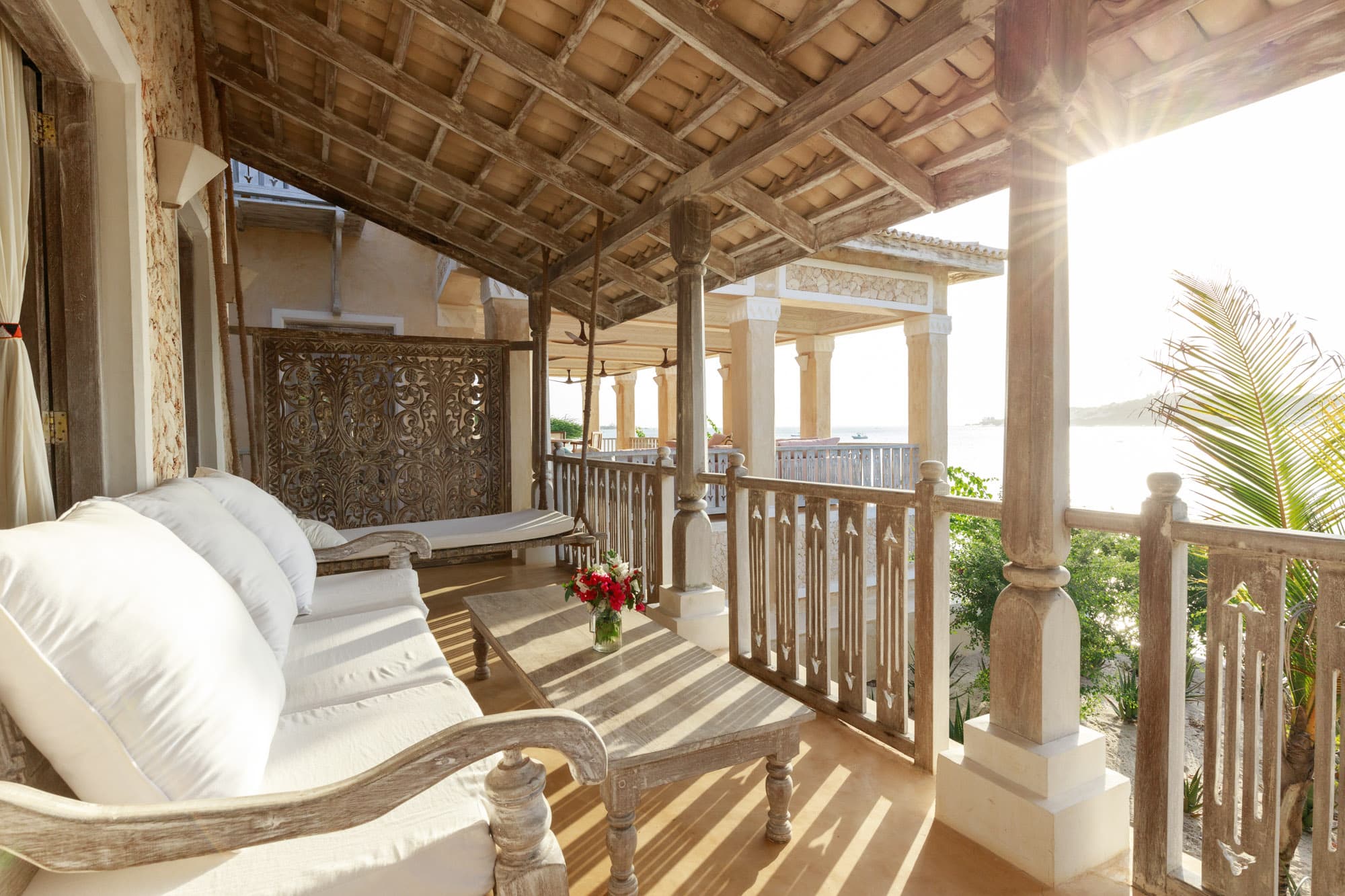 Mangrove-side terrace lounge at golden hour